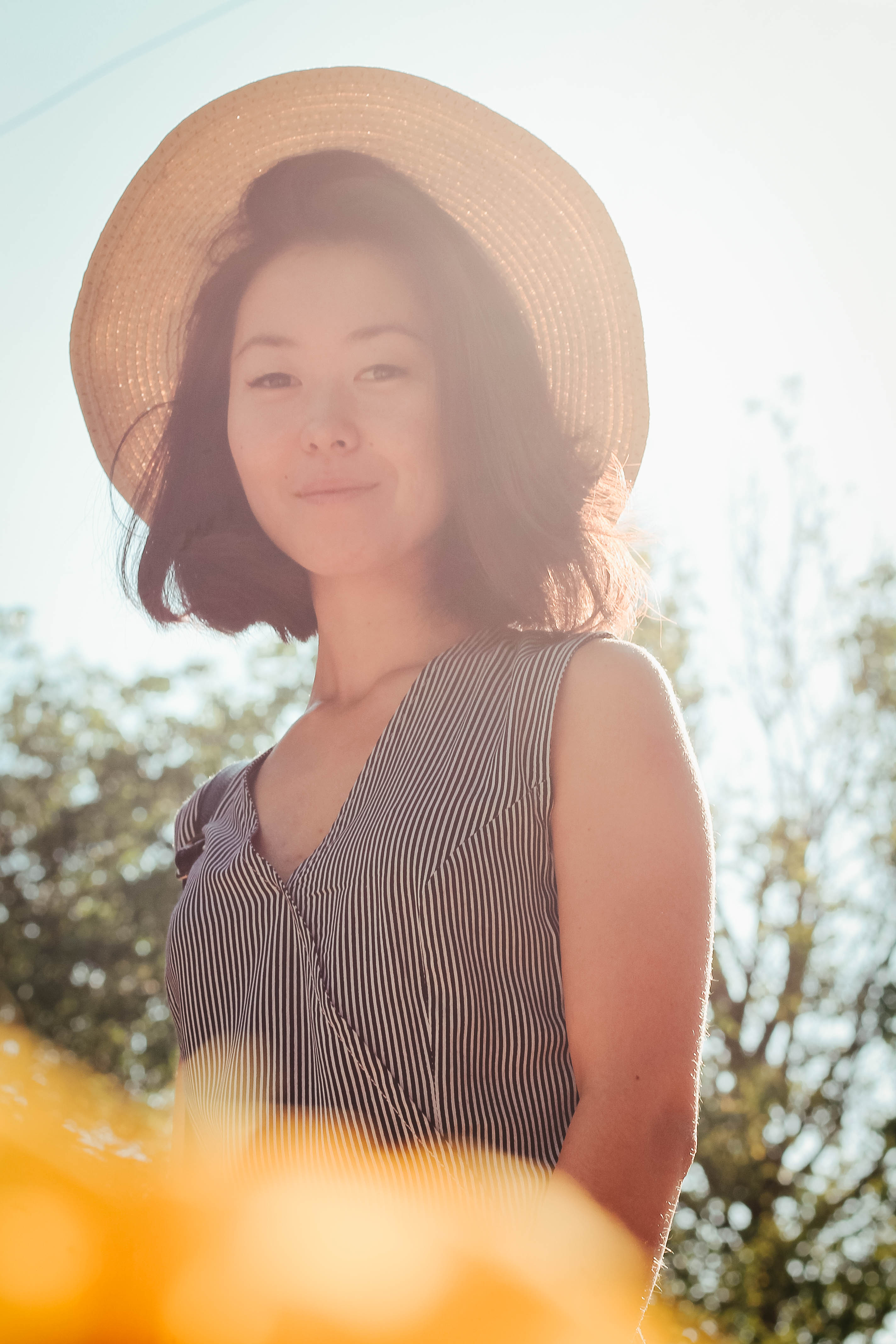 Portrait of Ira wearing a sunhat outdoors